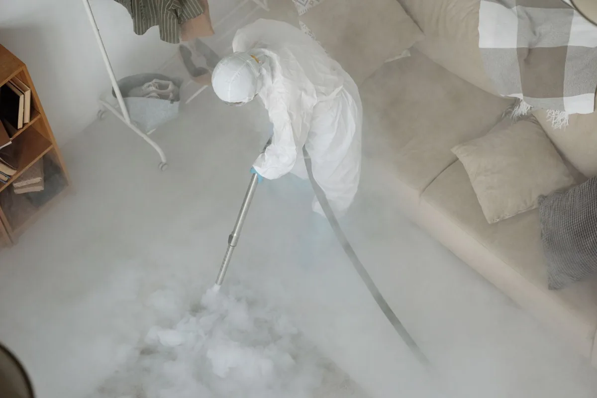 Biohazard cleanup technician in protective equipment, Cattaraugus, NY